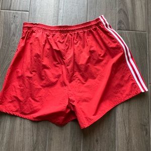 Adidas red shorts. Super Cute and never worn.